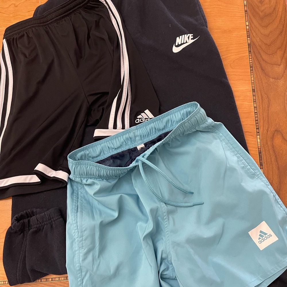 Adidas Large kids/XS Adult blue shorts and Large kids Nike sweats LOT
